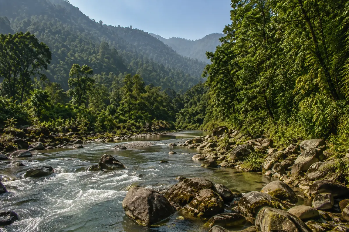 Suntalekhola Travel Guide 2026 with forest and river landscape