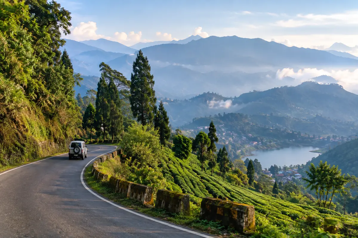 Scenic mountain road from Darjeeling to Mirik through green hills